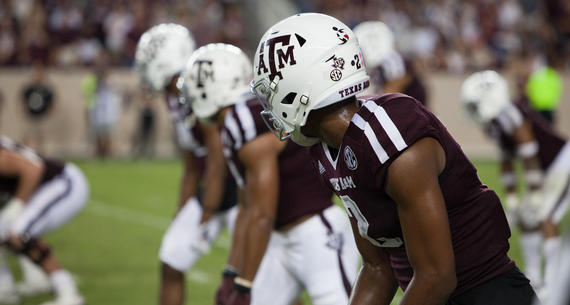Side view of Texas A&M players at a game.